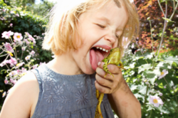 Ivy Bond gets close to nature in a still from the Project Wild Thing documentary